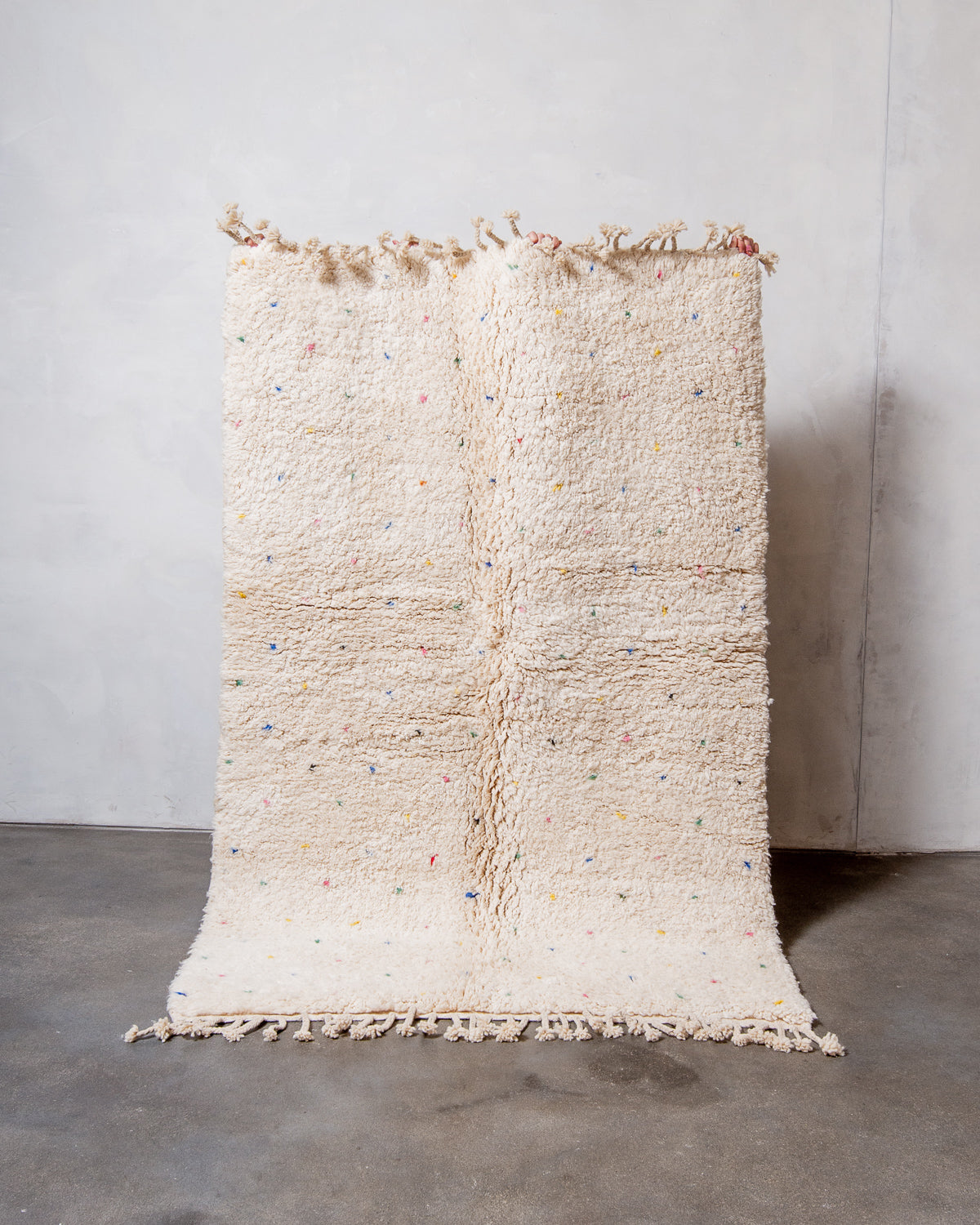 Modern, designer, handcrafted Berber rug from Morocco. Beniourain carpet with beautiful colours and patterns and fluffy wool texture.